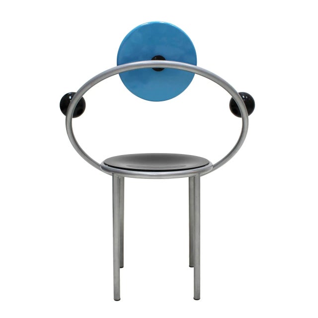 Set of two chairs mod. "First Chair" designed by Michele de Lucchi for Memphis Milano, with structure in metal, seat...