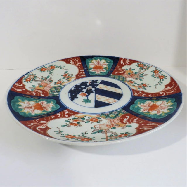 Hand-painted Chinese porcelain charger with imari decoration, dated to early 20th century. Unmarked, traditional blue...