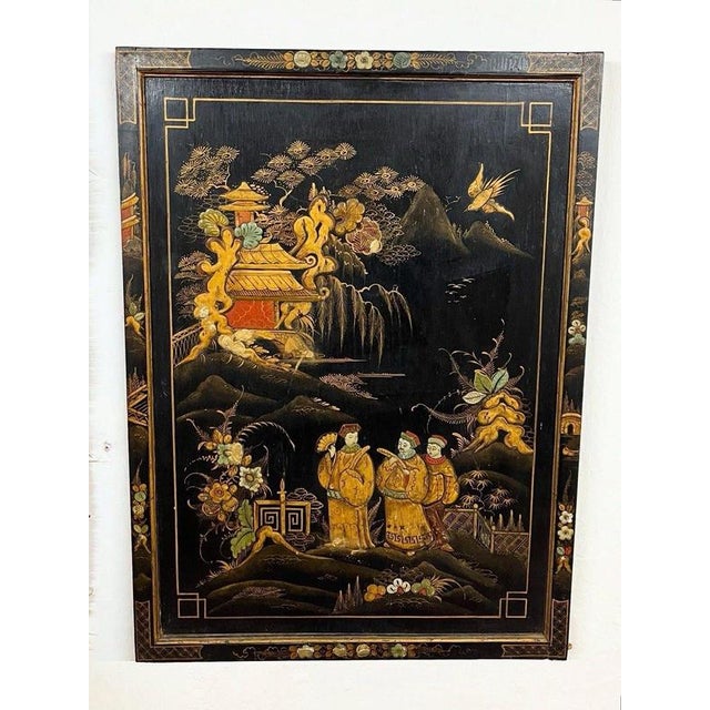 A striking 20th century decorative panel executed in the Chinoiserie tradition, featuring an elegant black lacquer ground...