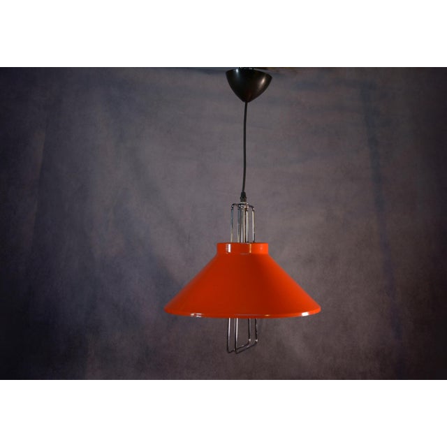 Orange Lacquered Metal Design Pendant Light, 1970s, in Good conditions. Designed 1970 to 1979 Up to 250V (Europe/UK...