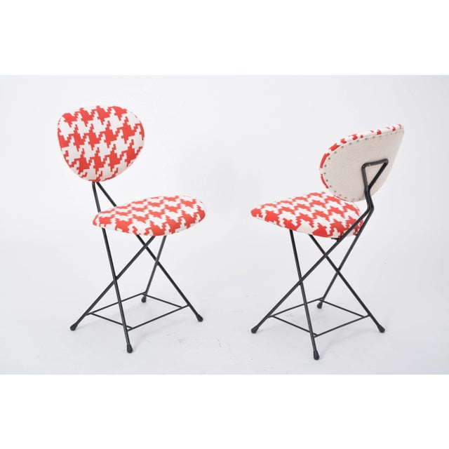 F & t chair designed by rob parry in the netherlands in 1953. The chair features a black lacquered tubular metal frame and...