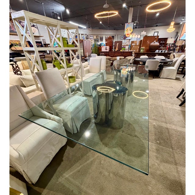 Striking vintage Curtis Jeré Trefoil dining table featuring a sculptural chrome-finished metal base with a distinctive...