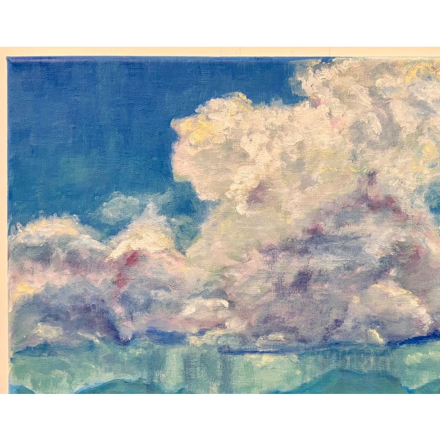 Abstract impressionist landscape of colorful summer rain clouds over distant mountains. Signed on the lower left and on...