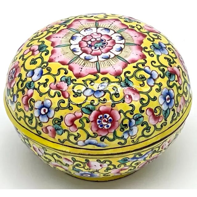 Chinese Export Yellow Floral Beijing Enamel Round Box China, 20th Century A stunning example of 20th-century Beijing...