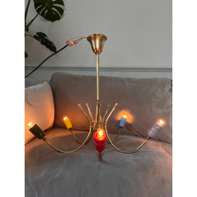 A rare vintage chandelier sourced from the cotswolds, dating from the 1950s–1960s, measuring approximately 50 cm in height...