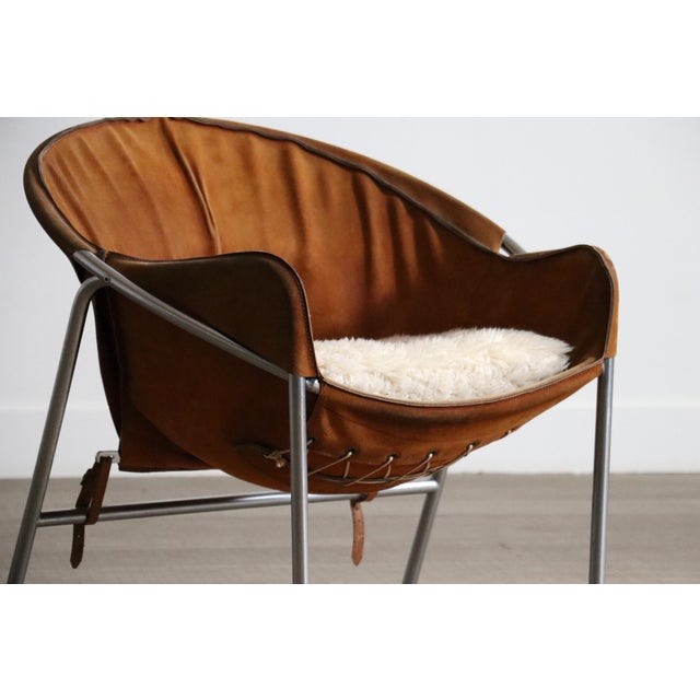 Designed by Erik Jørgensen for Bovirke in 1953, the BO361 lounge chair combines natural materials with precise...