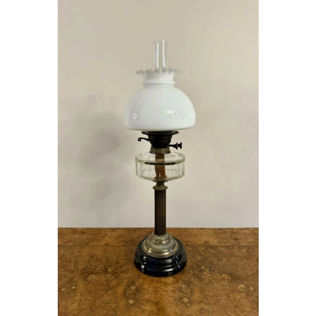 Wonderful quality antique Victorian oil lamp, having the original opaque glass shade with a frilled rim, a glass chimney,...