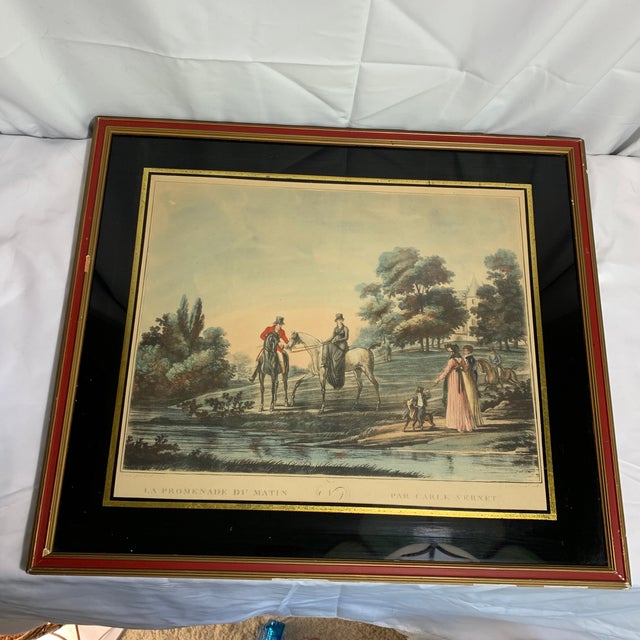 Add a touch of old-world Parisian elegance to your space with this stunning antique colored engraving titled "La Promenade...