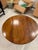 Small drop leaf table. Wood type is believed to be walnut. Slightly oval shape; when both leaves are extended the width is...