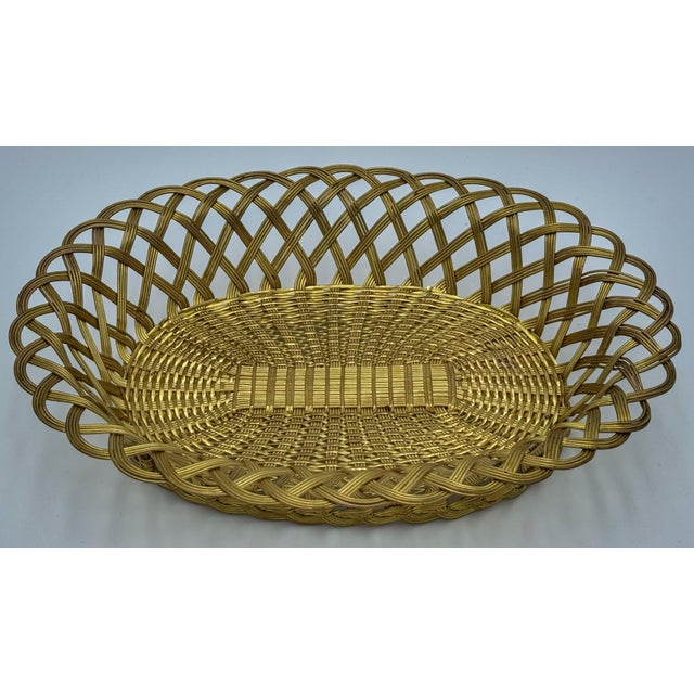 Napoleon III Gilt Brass Woven Oval Basket, France, 1870s 13" W × 10.5" D × 3" H Elegant and finely executed, this Napoleon...