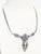 Zodiac Ram, Hallmarked Sterling to the back of the ram. Ornate Ram head in a setting ornamented by florets and scrolls, a...