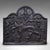 This is an antique decorative fire back. An English, cast iron relief fireplace reflector with Carolean taste, dating to...