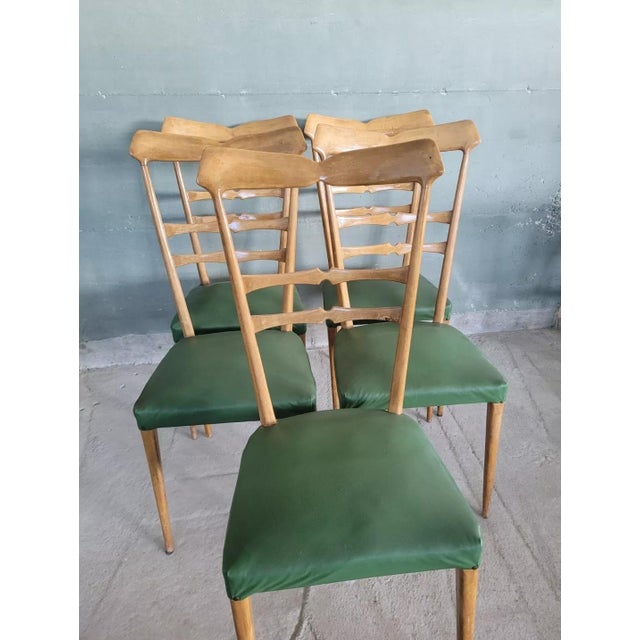 Set of five beech wood dining chairs with green eco-leather seats