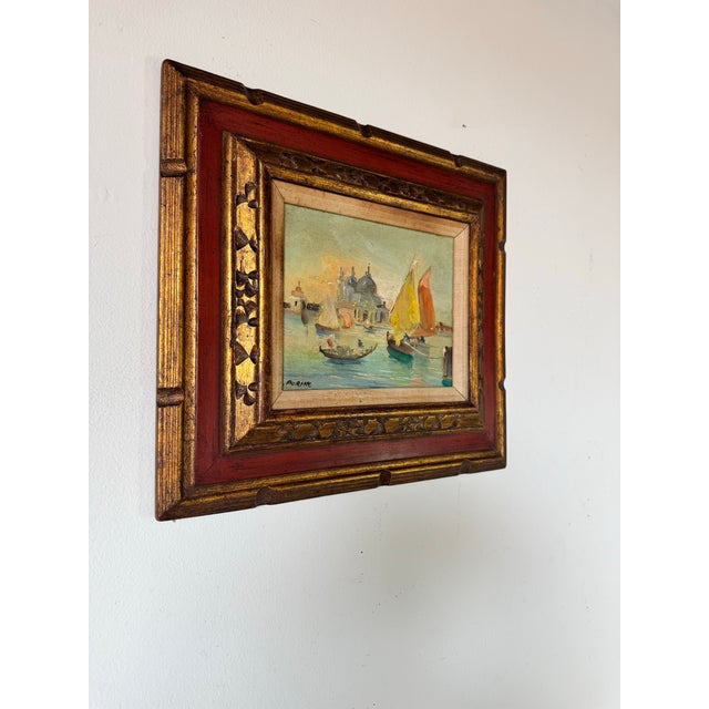 Transport yourself to the romantic waterways of Venice with this charming 1970s vintage oil painting by Italian artist L....