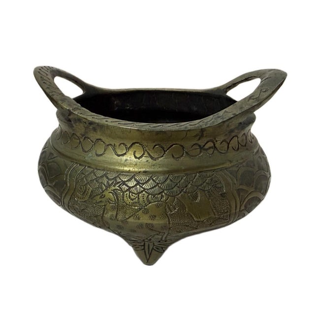 Mid-20th Century Chinese Export Chinoiserie Etched Brass Tripod Censer A classic mid-20th-century Chinese export tripod...