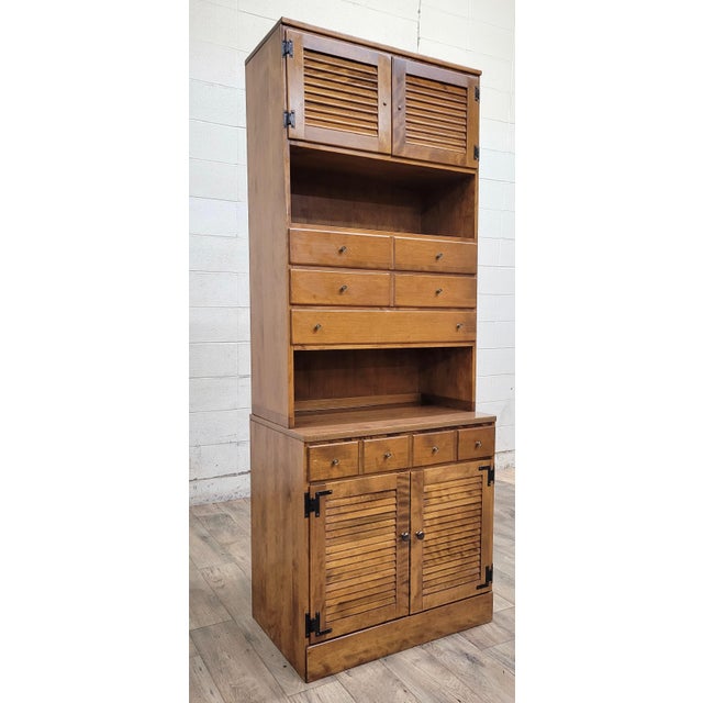 This is a gorgeous vintage Ethan Allen Heirloom Nutmeg Maple Custom Room Plan CRP 30” shutter door cabinet with hutch that...