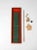 A is an exceptional vintage tabletop bowling game. A slender felted wood board shapes the game with ten wooden skittles, a...