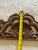 Hand carved wood pediment. This Detailed wood carving features floral and scroll elements. The ornate design showcases a...