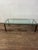 Stunning mid century brass or bronze coffee table with 3/4" glass top. Simplistic design with low profile. Curbside...