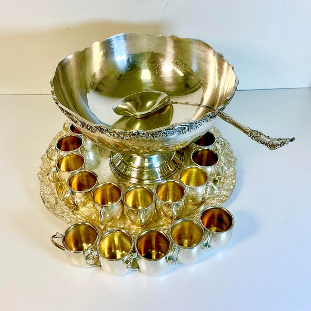 This stunning 23 piece Punch Bowl Set is from Towle Silversmith. This is pure old-Hollywood Regency and Empire style for...
