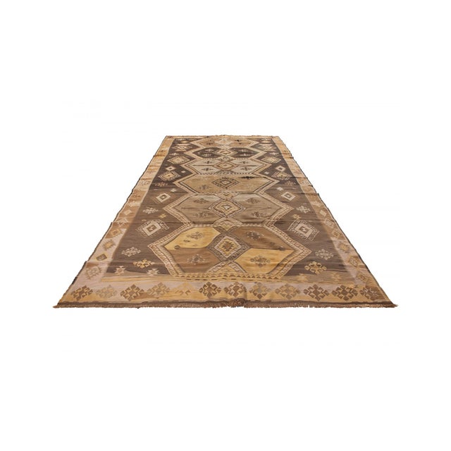 Vintage handwoven decorative kilim rug from Kars region of Turkey. Approximately 50-60 years old. In very good condition.