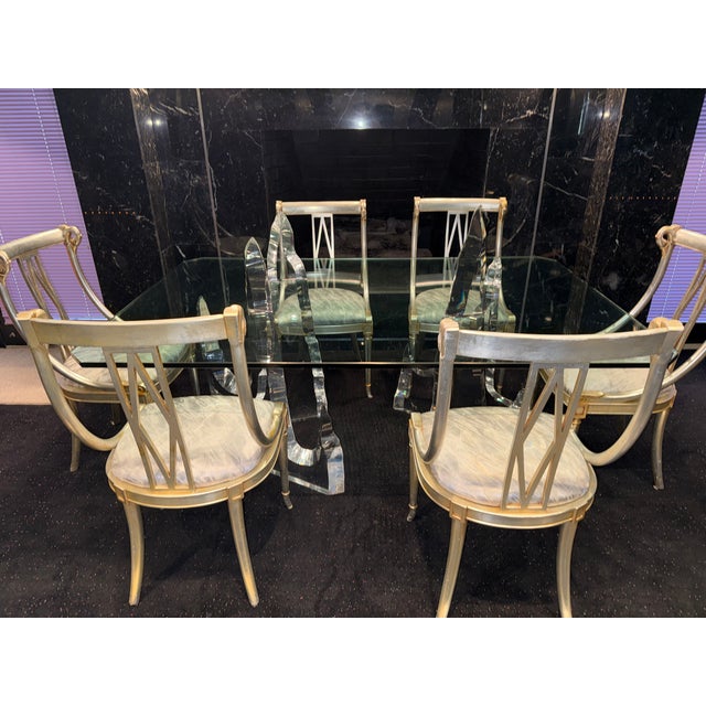 Offering rare artist signed lucite bases (2) and glass top “Lion in Frost” designer dining table measuring 72” x 48”. 3/4...