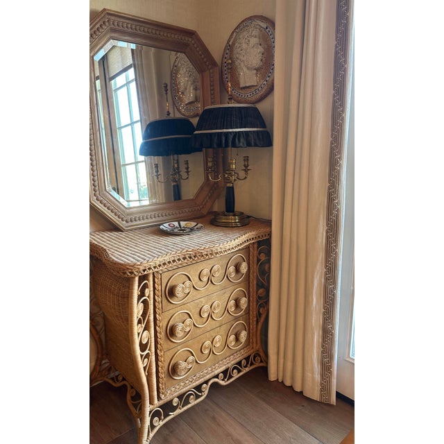 Octagonal cerused-oak mirror with a thick chunky stacked molded frame and beveled glass. The cerused-oak finish has a soft...