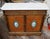 We date this to circa 1860 Features Sevres porcelain plaques with hand painted cherubs White marble top is smooth and chip...