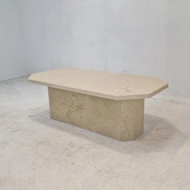 Very nice Italian coffee or side table handcrafted out of travertine, 1980s. It is made of beautiful travertine. Please...