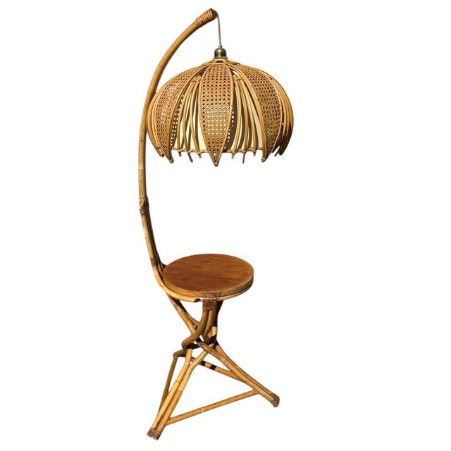 Magnificent 1960s rattan and bamboo living room lamp. Handcrafted in the style of Louis Sognot. European Plug (up to...