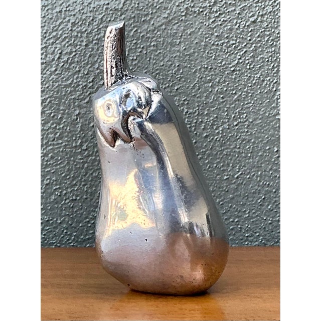 This whimsical set of three vintage decorative eggplants brings a touch of high-glamour Hollywood Regency flair to any...