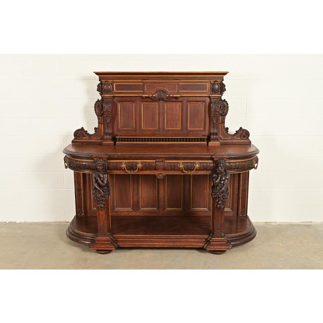 An exceptional antique Victorian or Renaissance Revival sideboard, credenza, or bar cabinet Attributed to R.J. Horner &...