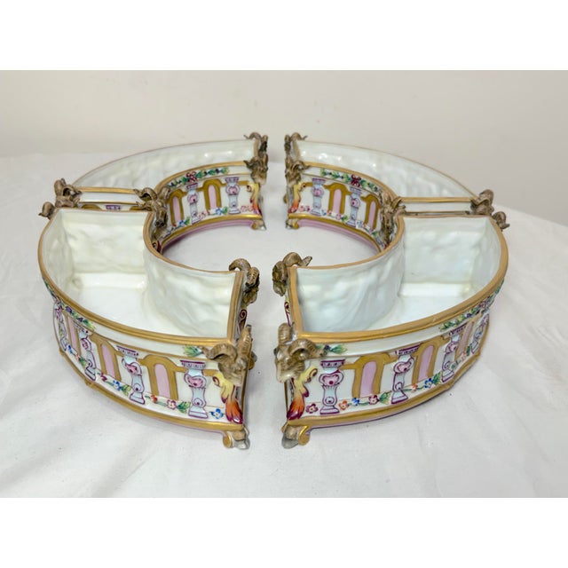 This antique 4-piece Italian Caposimonte porcelain table garniture set is a stunning example of hand-painted porcelain...