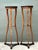 This striking pair of tall Biedermeier-style pedestals exemplifies Neoclassical grace and architectural sophistication....