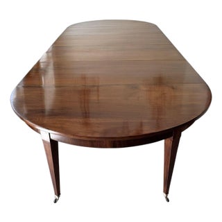 Large Scale 19th Century French Restauration Walnut Extension Dining Table With Five Leaves and Additional Support Legs For Sale