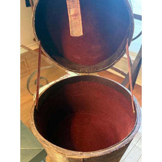 A truly exceptional survivor from the mid-19th century, this antique hat box is brown leather over a sturdy wood frame,...