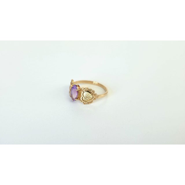 We are pleased to present a charming and highly romantic ring from the turn of the twentieth century. Crafted in 14-karat...