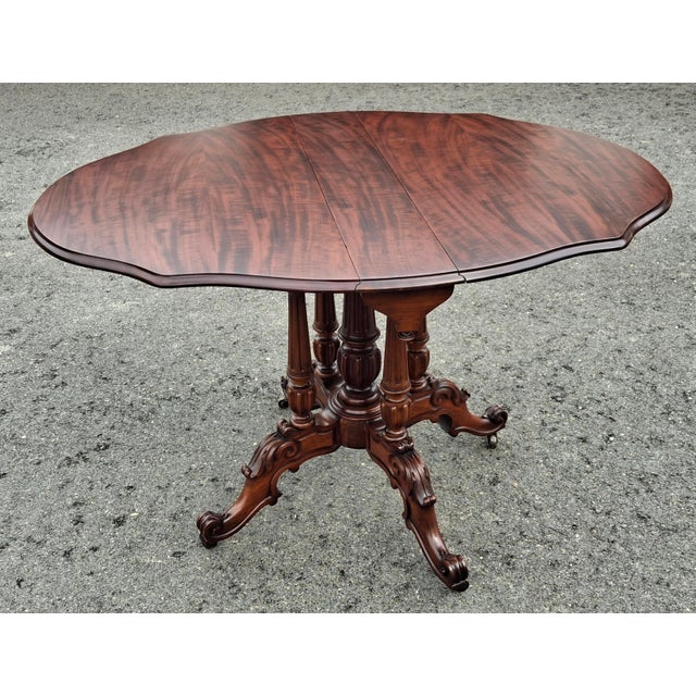 An Exquisite, professionally refinished versatile William IV Figured Mahogany Sutherland / Center Table / Breakfast table...