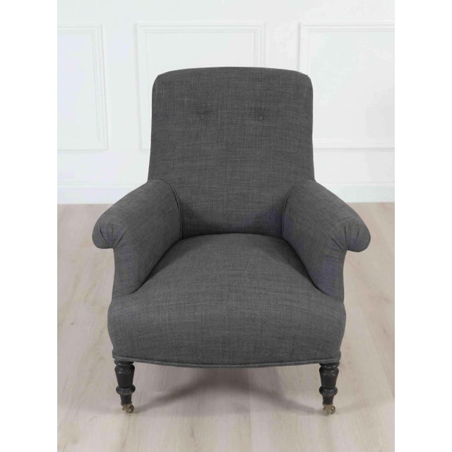Attractive early 20th century French armchair, circa 1910, featuring elegant proportions and a sophisticated silhouette....