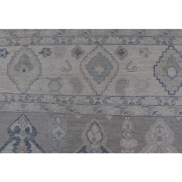 Textile Turkish Oushak Rug With Soft Gray Field and Pale Blue Geometric Motifs For Sale - Image 7 of 16