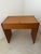 Classic Danish mid-century modern teak dressing table with rounded corners and brass hardware.