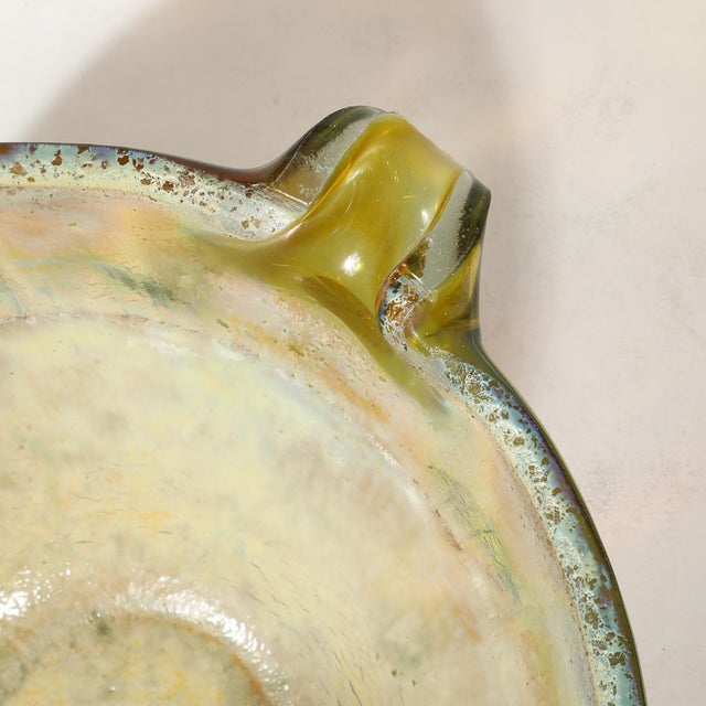 A bold and breathtaking example of mid-century Italian artistry, this hand-blown Murano glass centerpiece bowl by renowned...