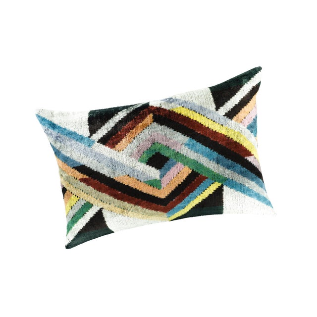 A mesmerizing fusion of color and texture, the Icarus Silk Velvet Ikat Pillow Cover is a striking statement piece for any...