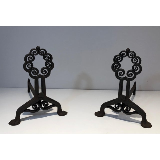 This beautiful and very interesting pair of andirons is made of wrought and hammered iron. It is a Swiss work from the Art...