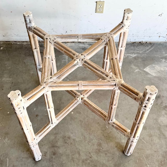 A striking vintage bamboo table base inspired by the iconic craftsmanship of McGuire, celebrated for its sculptural use of...