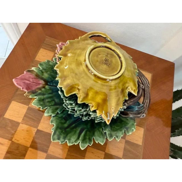 Majolica service from around 1900, 7 pieces. Dimensions: Height x Width x Depth: Plate 34 x 27 cm, Small bowls 20 x 17 cm....