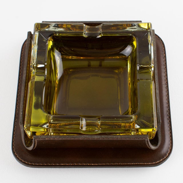 This striking desk accessory exemplifies an iconic blend of luxury and functionality. The ashtray was meticulously crafted...