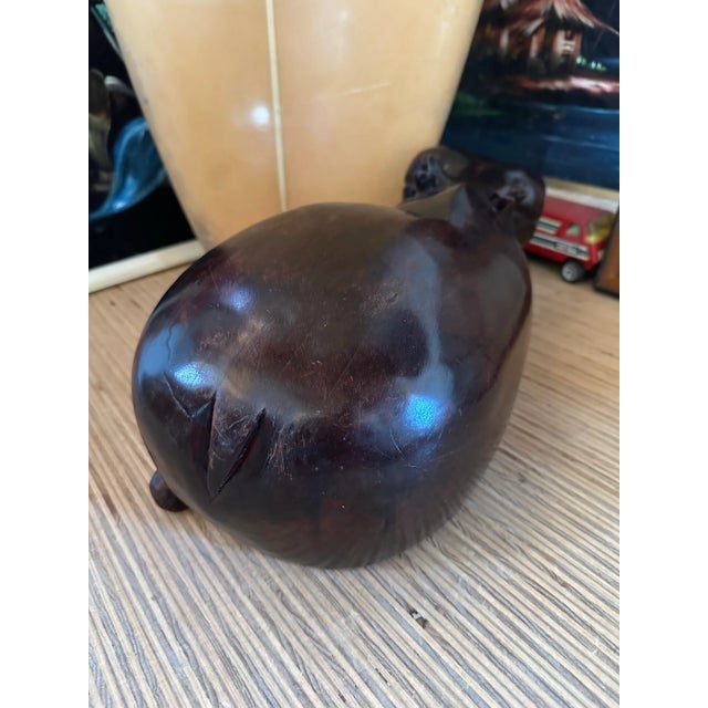Large wooden hippo. Hand carved and cute as can be. Very dense and heavy wood. Almost like an ironwood. In great vintage...