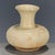 This is a charming vintage pottery vase, crafted from earthenware with a rustic, hand-thrown character. The vase features...