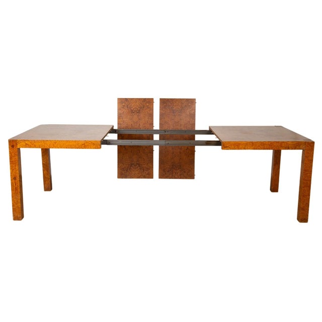 Impressive Mid-Century modern, faux burled olive ash wood, expandable Parsons dining table in the style of Milo Baughman....